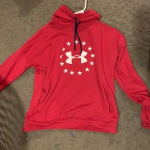 This is an Under Armour sweatshirt. It also has vented sleeves.